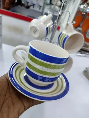6 Cups and Saucer With a Stand