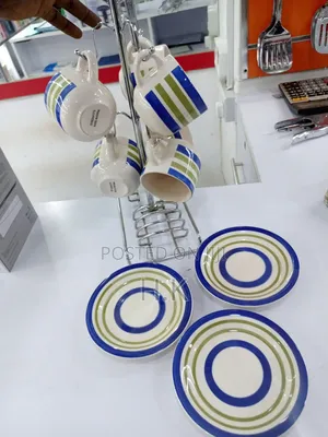 6 Cups and Saucer With a Stand