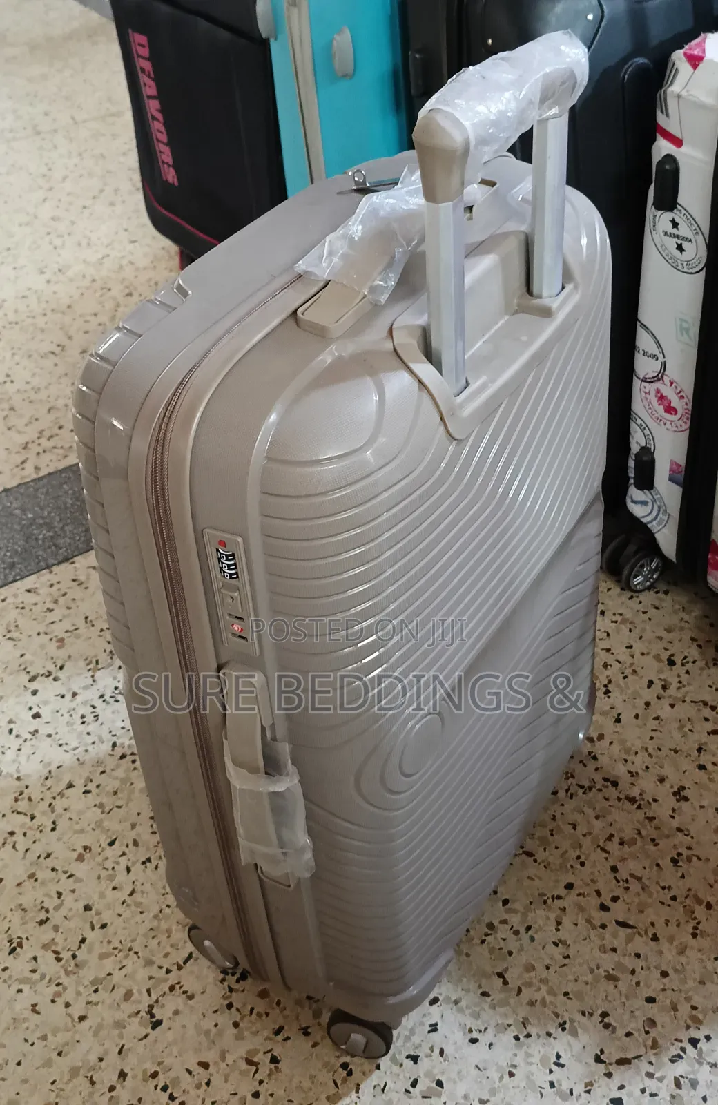 Medium Royal Rubber Suitcase