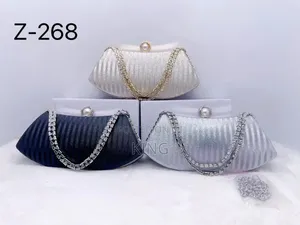 Women's Elegant Clutch. Black, Silver and Gold Colours
