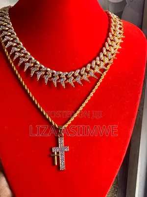 Iced Out Cuban Chains With a Crucifix Small Pendant