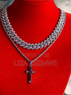 Iced Out Silver Cuban Link Chains With a Silver Crucifix