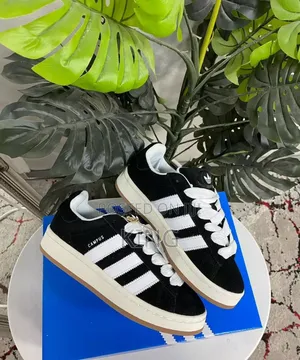 Adidas Campus Black and White" Sneakers.