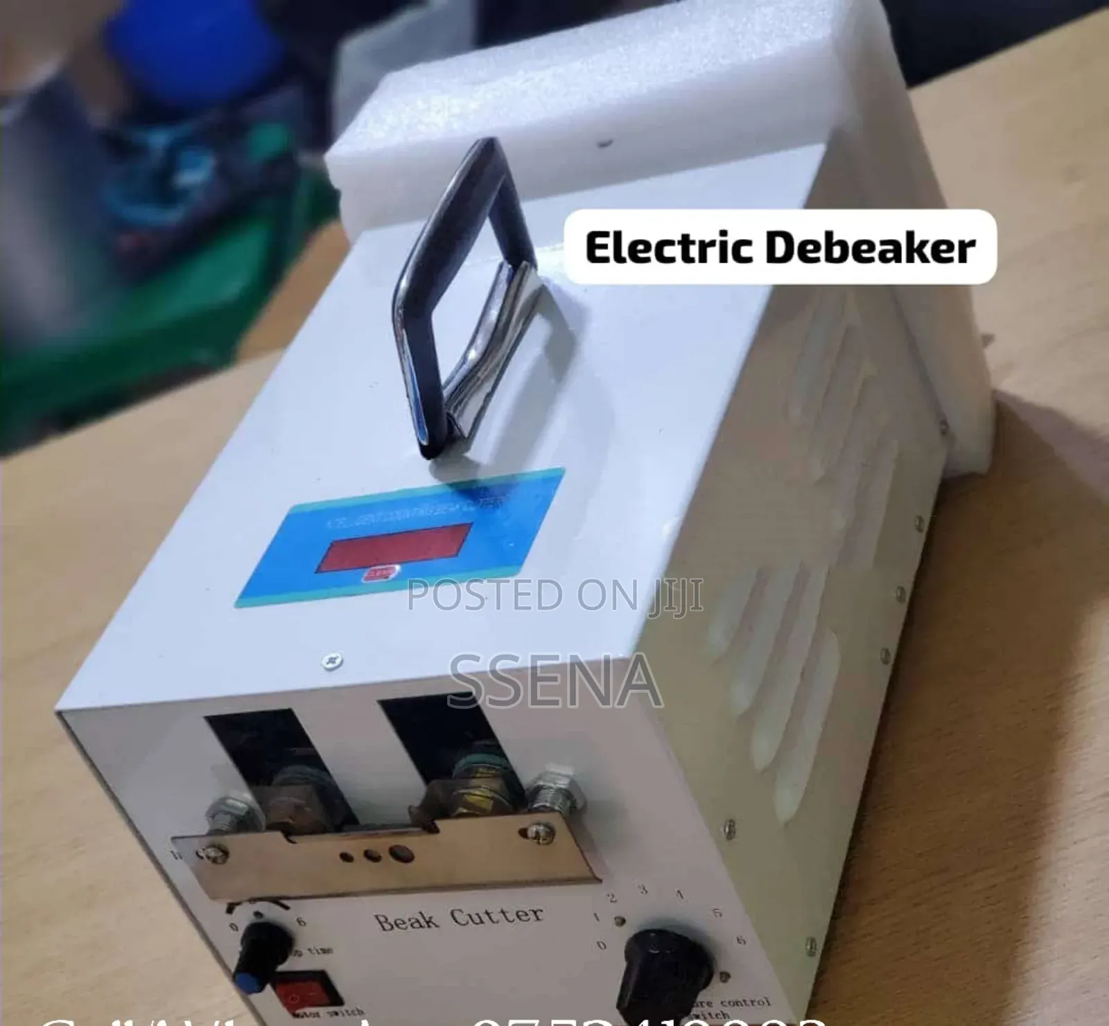 Electronic De-beaking Machine