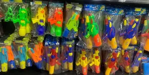 Kids Playing New Plastic Water Guns