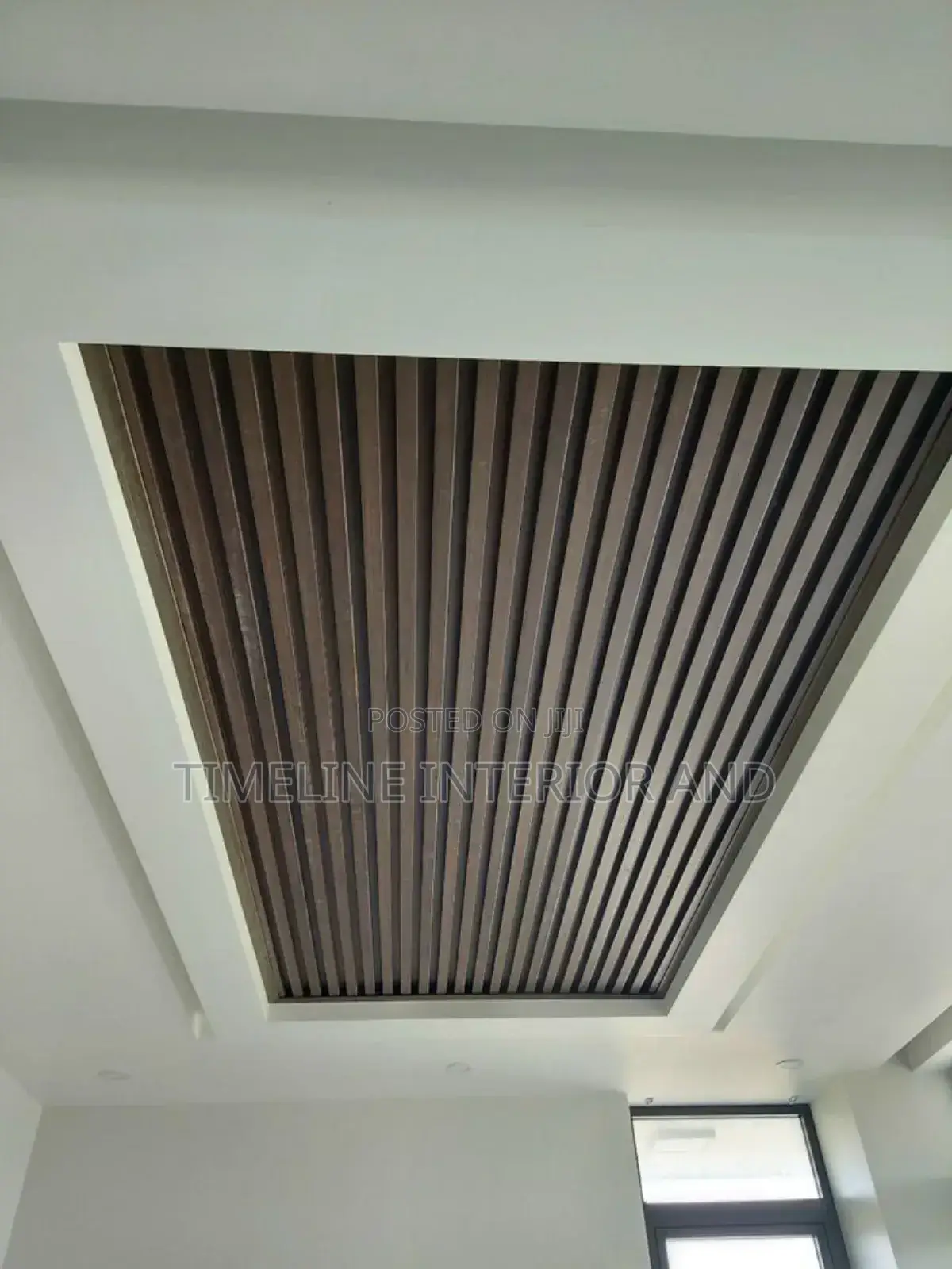 Fluted Panels and Gypsum Ceiling.