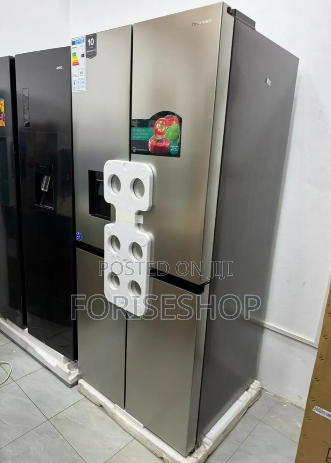 Hisense 561 Side by Side Refrigerator With a Dispenser