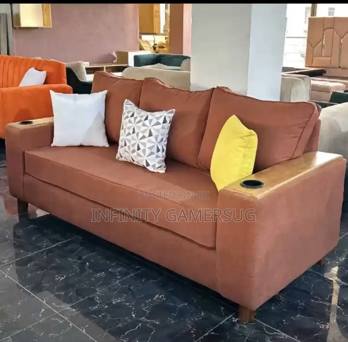 A Classy 3seater Sofa in Brown Available.