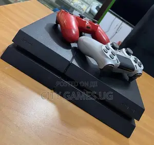 Sony Playstation 4 Standard With Controllers and Games