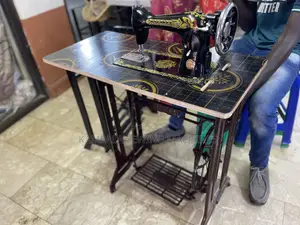 First Class Singer With Original Stand Sewing Machine