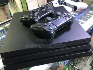 Playstation Ps4 Pro Console With 2 Pads 10 Games