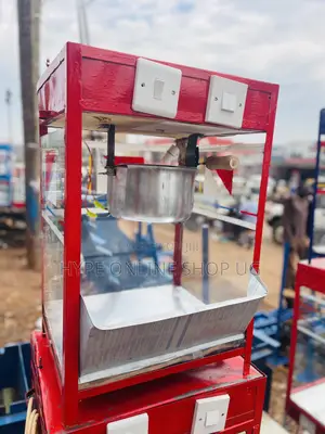 Reds Shine Popcorns Machine