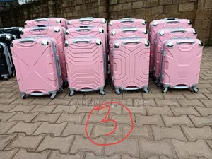 A Set of Three Rubber Suitcases Warranty Available
