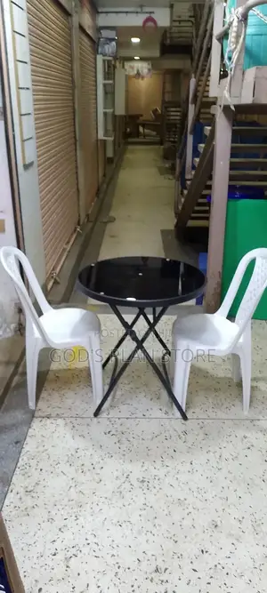 Glass Table and Plastic Chairs Set