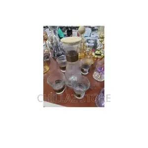 Set of Glassware With Bamboo Lids.