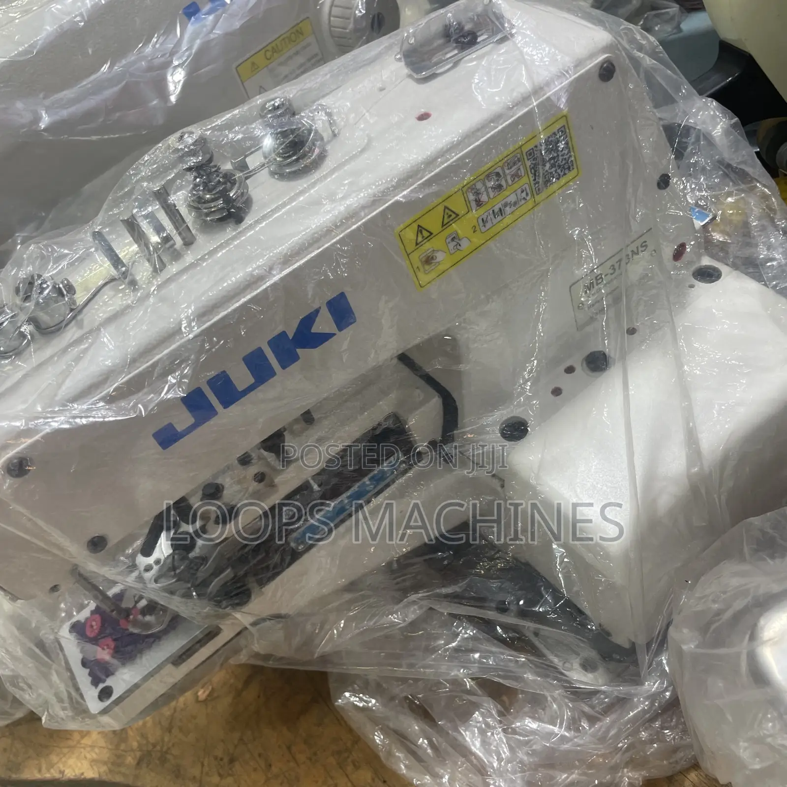 New Button Attach Machine