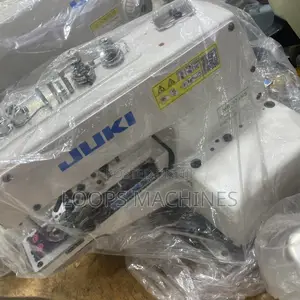 New Button Attach Machine