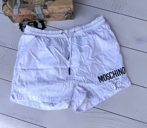 Moschino White Swim Shorts. Retro White
