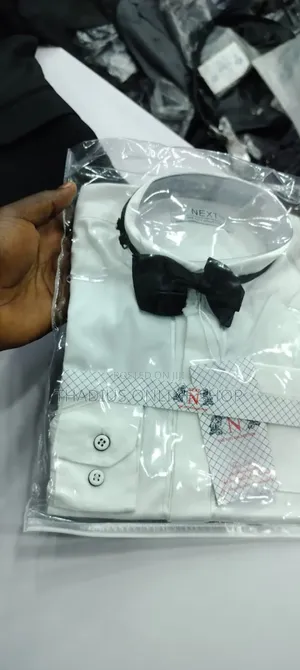 Boys Long Sleeved White T-Shirts With a Bowtie