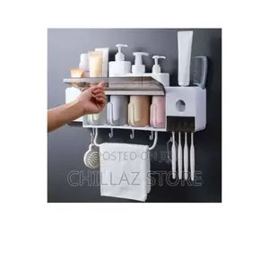 4 Cup Wall Mounted Toothpaste and Toothbrush Holder.