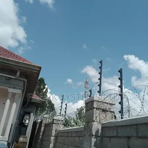 Electric Fence System With Barbed Wire 100fts by 50fts