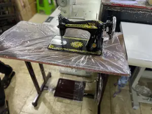 New Sewing Machine Singer With Original Stands Plus