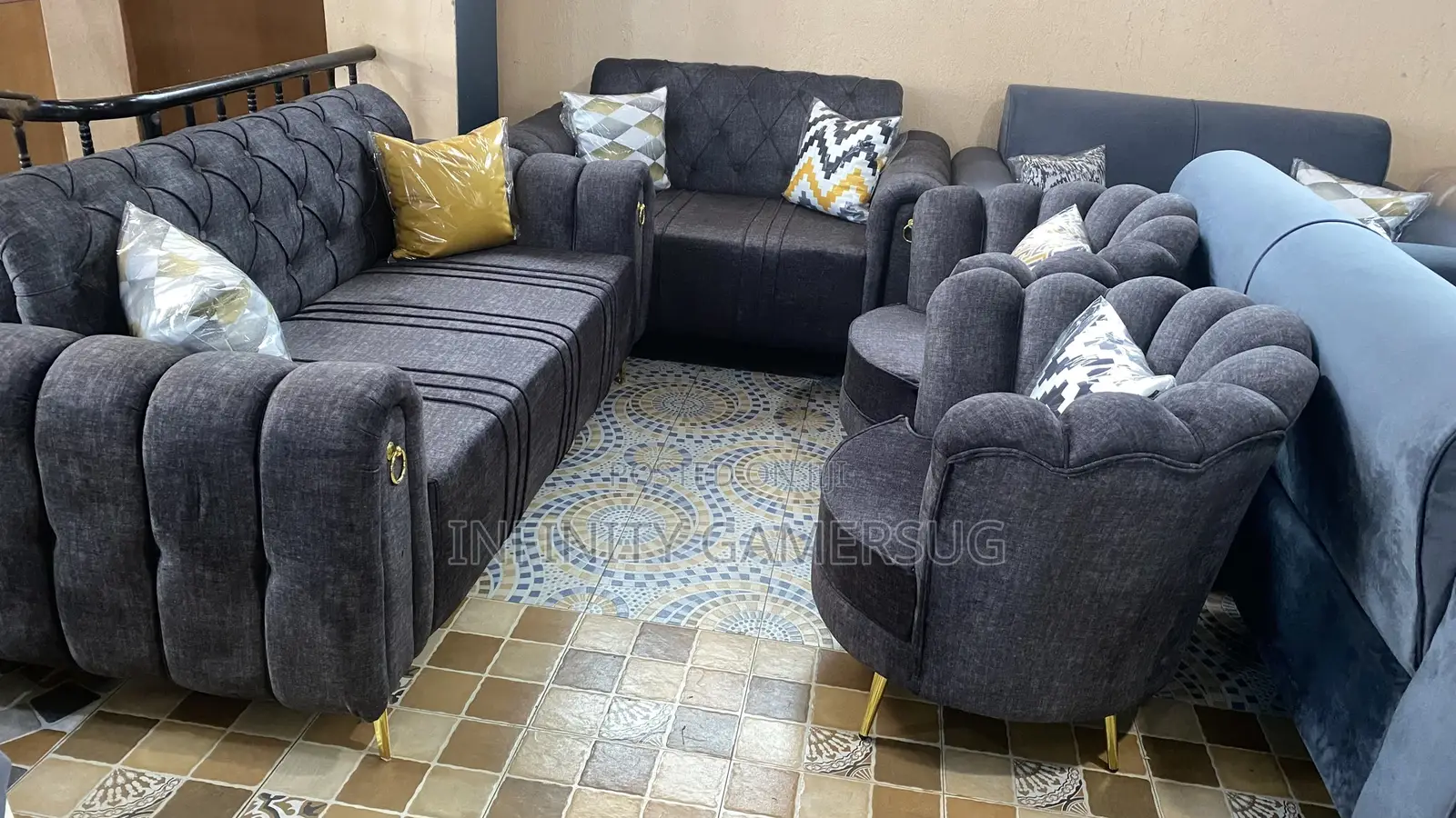 A Luxurious Chesterfield Sofa in Gray Readily Available