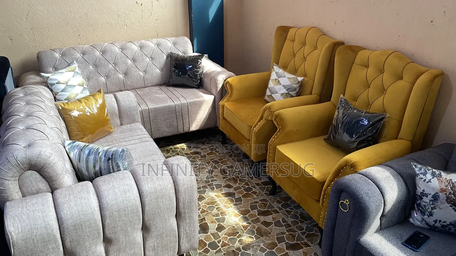 A Classy Sofa in Cream Brown and 2 Single Chairs Available