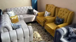 A Classy Sofa in Cream Brown and 2 Single Chairs Available