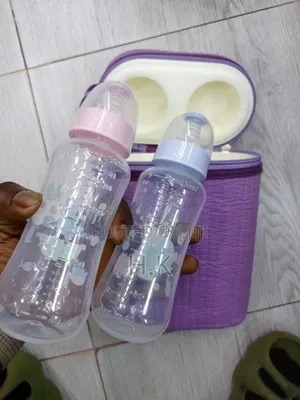 Baby Bottle Warmer With Two Added Bottles