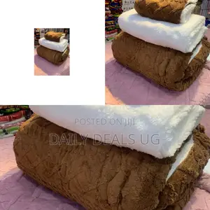 Brown and White Fleece Blanket