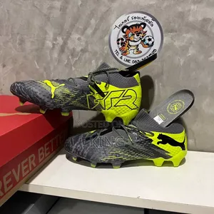 Vouched Football Boots. Puma Future Ultimate Low FG/AG