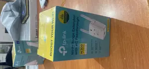 Tp-Link Wi-Fi Range Extender With AC Pass Through