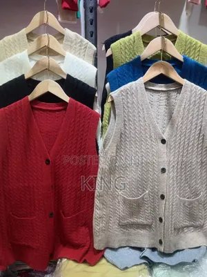 Supreme Button Knit Sweater.
