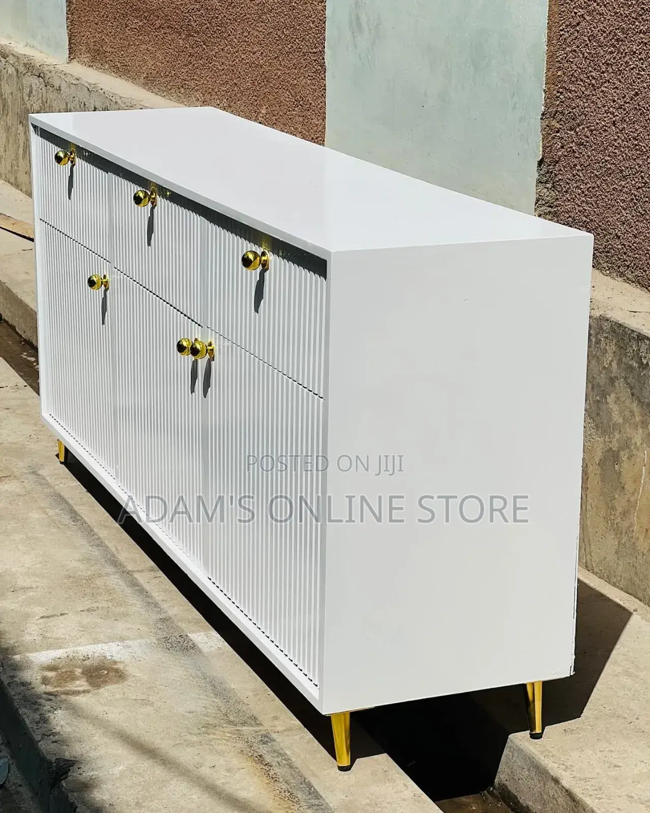 White Cabinet With Gold Leg