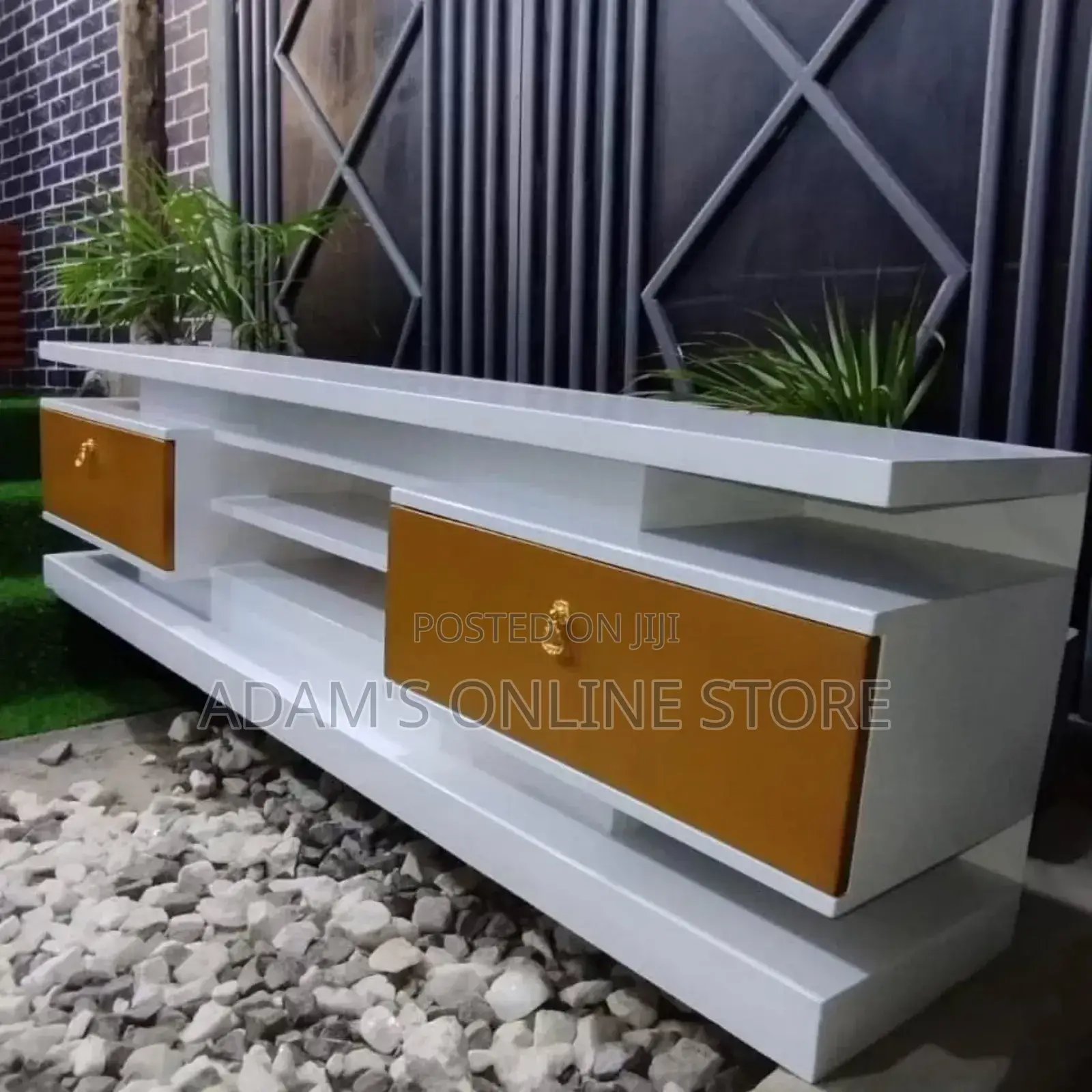 White TV Stand With Brown Color on Drawers