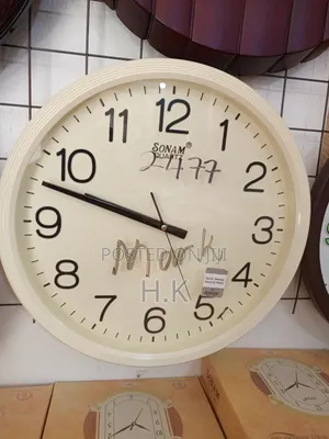 Sonam Quartz Analog Wall Clock. Mark 2477