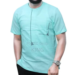 African Wear. Seafoam Green Kitengi Shirt.