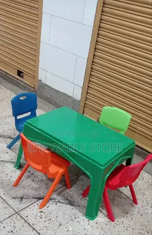 A Set of Plastic Kids Table and 4 Chairs Brand New