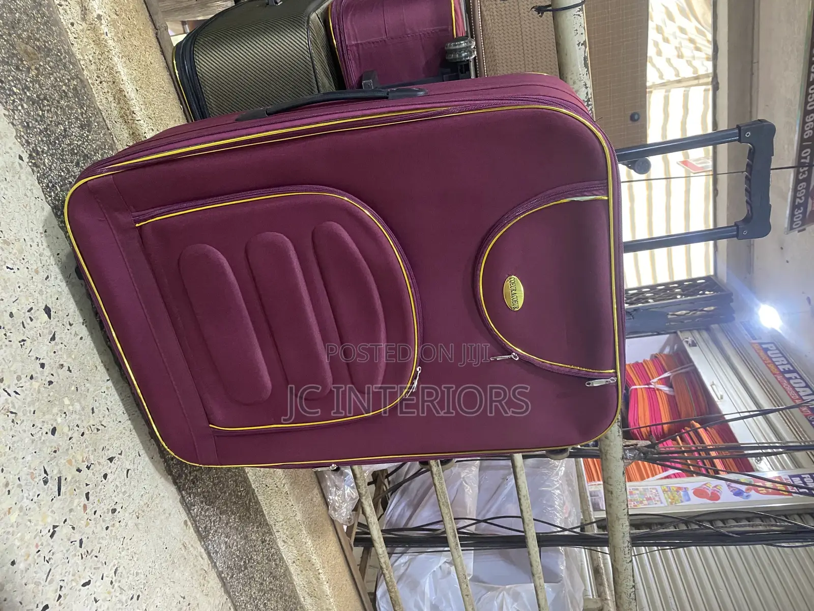 Maroon Cloth Suit Case