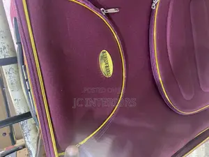 Maroon Cloth Suit Case