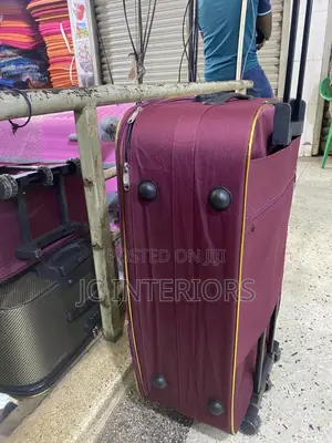 Maroon Cloth Suit Case
