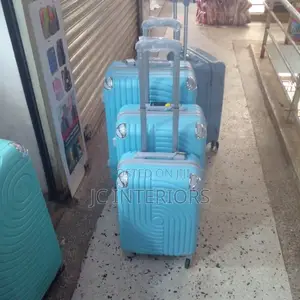 Three Pieces of (Blue Water) Plastic Suit Cases