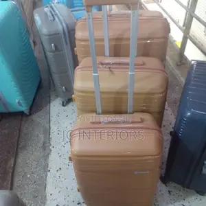 A Set of Rose Gold (Brownish) Suit Casez
