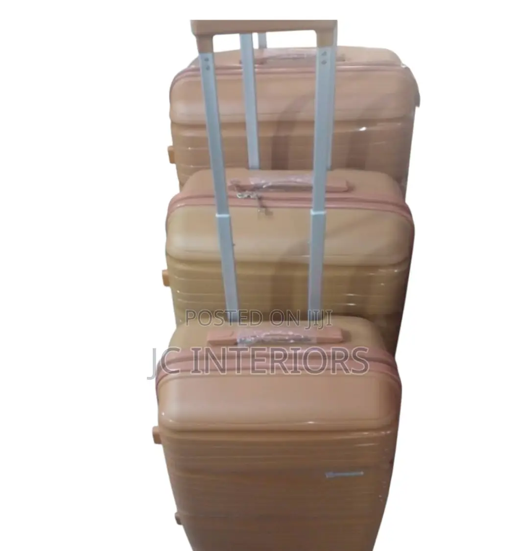 A Set of Rose Gold (Brownish) Suit Casez