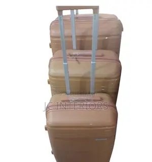 A Set of Rose Gold (Brownish) Suit Casez