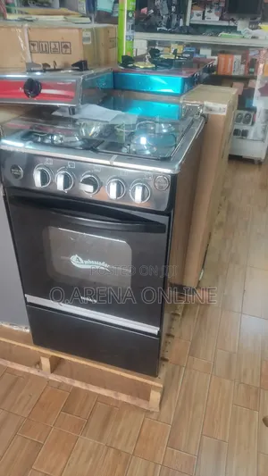 4 Gas Burner Cooker With Microwave One Year Warranty