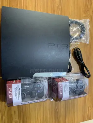 Sony Ps3 Slimconsole With Games and Pads