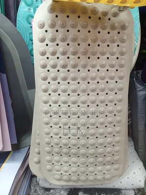 Beige Textured Rubber Bath Mat by Kenney.