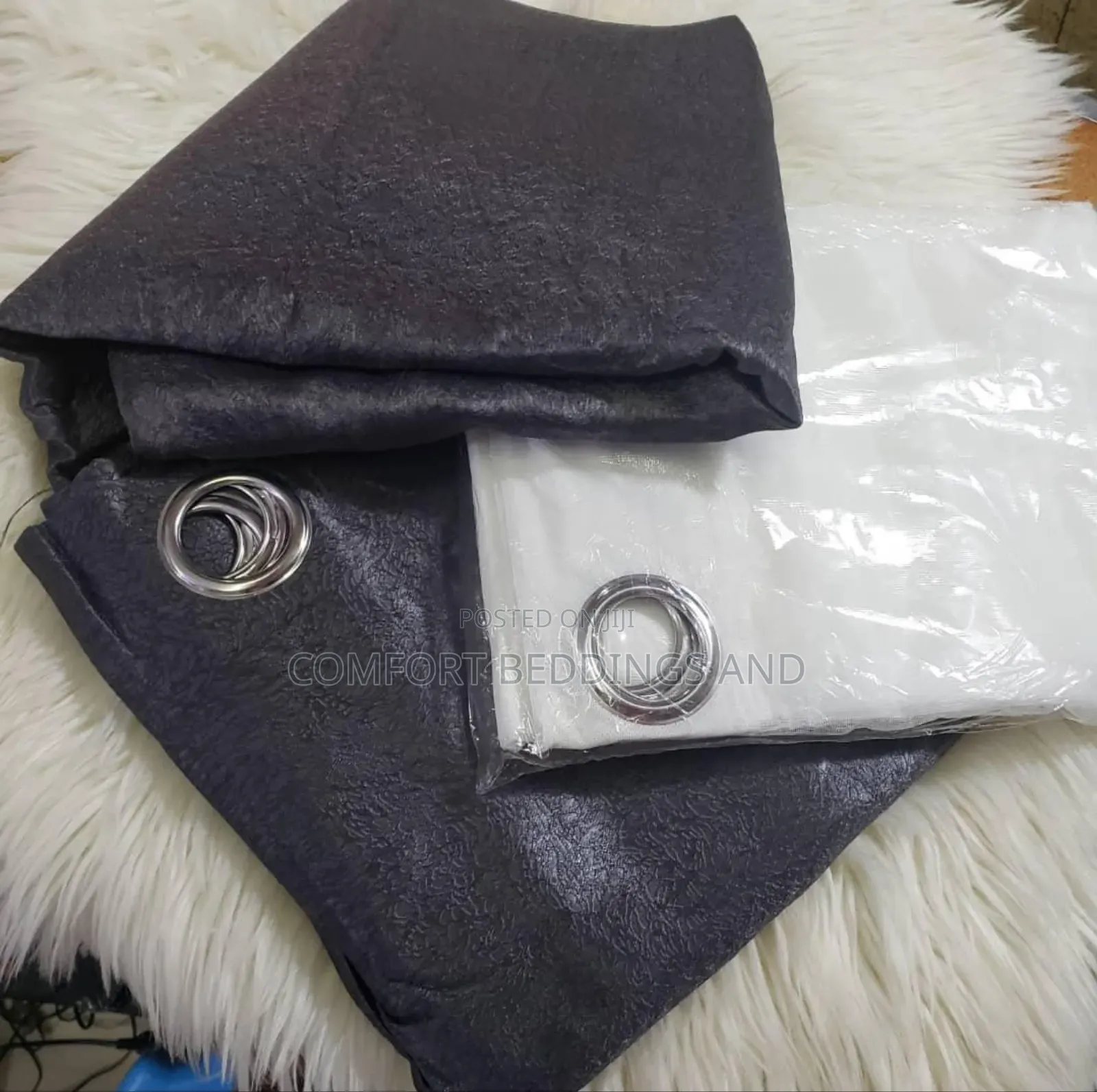 Dark Gray Curtains With a White Net